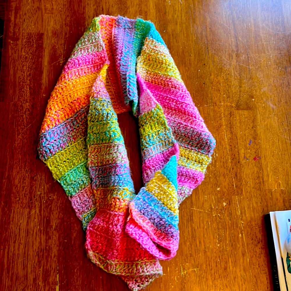 Boho handmade crocheted scarf wrap in pastels. 46” in length, 9” width